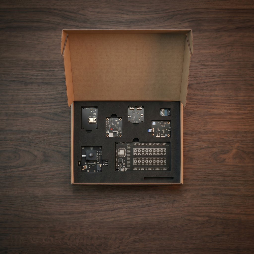NEXE Launch Kit: open box with modular boards and sensors arranged in custom foam inserts
