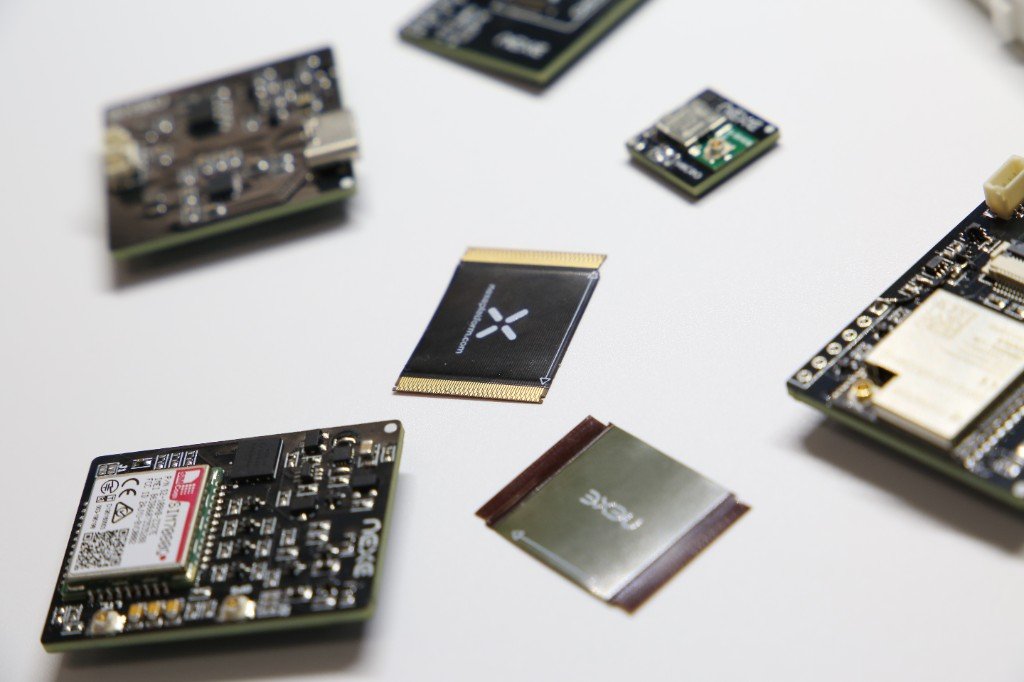 Flat lay of NEXE modules, connectors, and accessories